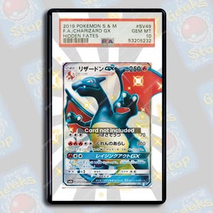 May include: A graded Pokémon trading card featuring Charizard GX from the Hidden Fates set. The card is encased in a protective holder with a GEM MT 10 grade. The card's artwork depicts a blue Charizard with red wings.