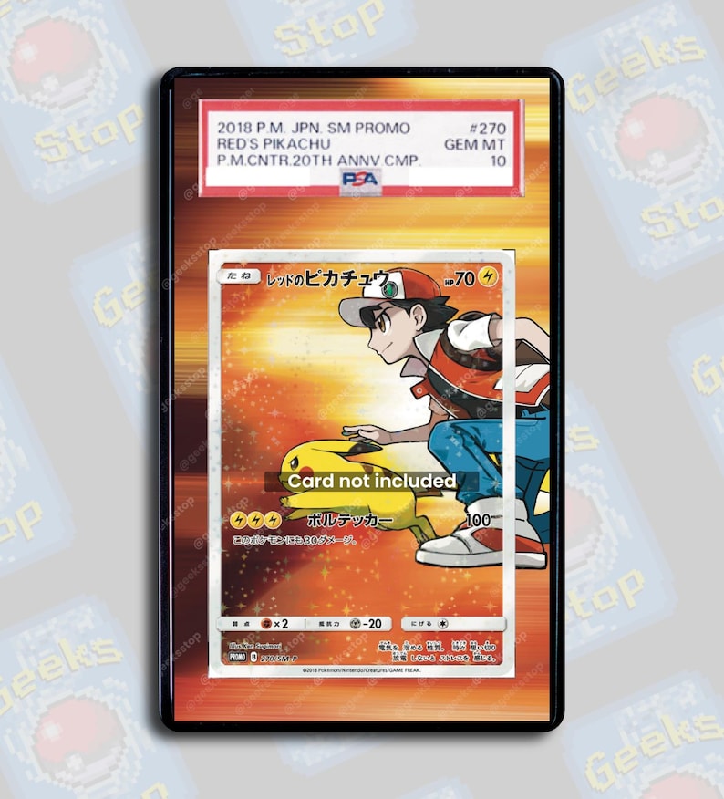 May include: A framed Pok&eacute;mon trading card featuring Red and Pikachu. The card is graded GEM MT 10 by PSA. The text on the card includes Japanese characters and the phrase "Card not included."
