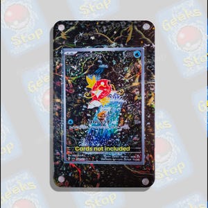 May include: A rectangular acrylic trading card display case featuring a dark, intricate forest-themed background with a Magikarp card inside. The case has four silver corner screws and displays the yellow text Cards not included at the bottom.