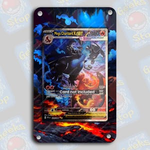 May include: A rectangular display case featuring a Mega Charizard X ex trading card graphic with a fiery lava and blue flame background. The card text reads Mega Charizard X ex, 360 HP, and Inferno X. The center text states Card not included.