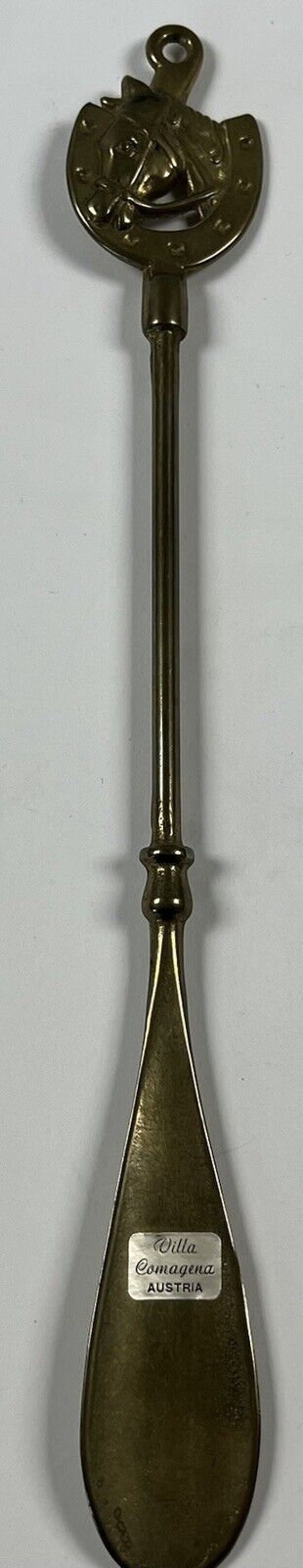Vintage brass shoehorn horse Gem