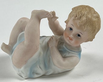 Vintage Andrea By Sadek 7534 Piano Baby Bisque Porcelain Boy Laying Down