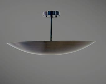 May include: A modern ceiling light fixture with a wide, shallow, silver-colored bowl-shaped shade and a black metal rod.