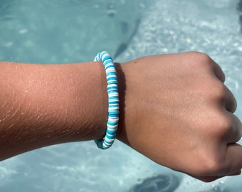 Blue multi colored clay beaded bracelet.