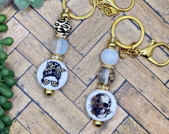Skull and Messy Bun Beaded Bar Keychain