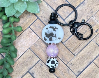 Reading Cow Beaded Bar Keychain
