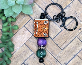 Sanderson Sister's Spellbook Beaded Bar Keychain