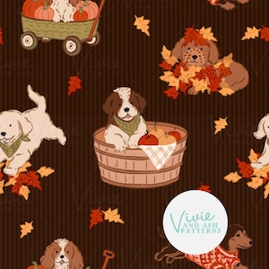 May include: A seamless pattern on a dark brown background featuring illustrations of puppies, pumpkins in a wagon, apples in a wooden basket, and scattered autumn leaves. The text Vivie and Ash Patterns is visible in a white circular overlay.