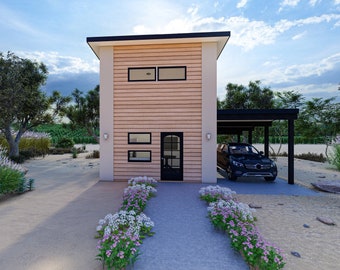 May include: A small, two-story house with a wood siding exterior and a black roof. The house has a covered carport on the side and a walkway leading to the front door. The house is surrounded by landscaping with flowers and shrubs.