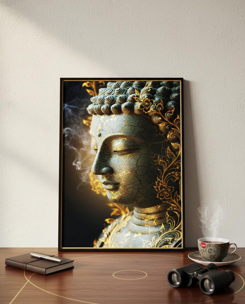 May include: Framed art print of a serene Buddha statue. The artwork features a detailed depiction of the Buddha's face with closed eyes, rendered in shades of teal and gold. Intricate floral patterns and crackle effects add to the artistic appeal. The print is displayed on a wooden surface.