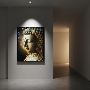 May include: A framed artwork featuring a serene Buddha statue. The statue is depicted in profile, with intricate gold detailing and a weathered, aged appearance. The artwork is displayed on a gray wall in a modern hallway.