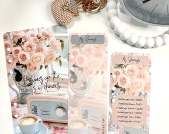 May include: Three rectangular planner inserts featuring a soft pink floral aesthetic. The designs include images of roses, a vintage-style radio, and a coffee cup. Text includes 'My Savings' and 'Perfumes are the feelings of flowers' with a list of six savings challenges ranging from $120 to $420.