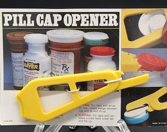 Abridor de pastillas de plástico vintage, giratorio, basculante, elevador, nuevo sin usar
