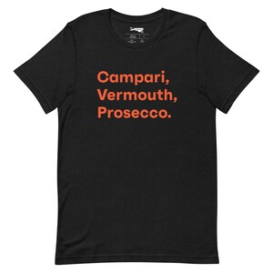 Puede incluir: Camiseta negra con el texto "Campari, Vermouth, Prosecco" en naranja.