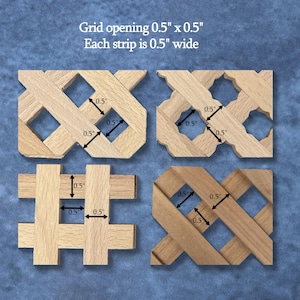four wooden strips with varying widths, each measuring 0.5 inches wide. The strips are arranged in a grid-like pattern, with each strip having a different width. The image does not contain any text, and the focus is on the visual representation of the wooden strips and their measurements.