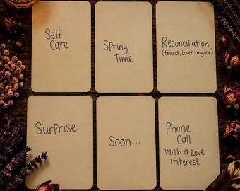 May include: Six rectangular cards with rounded corners arranged in two rows, each featuring handwritten text: Self Care, Spring Time, Reconciliation (friend, Lover anyone), Surprise, Soon..., and Phone Call With a Love interest on a dark wooden surface.