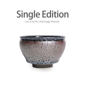 May include: A ceramic bowl with a distinctive metallic glaze. The bowl features a dark rim and a textured, silver-toned body with a brown base. The text "Single Edition" and "Lot.S1679 | Heritage Master" are visible.