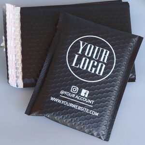 May include: Black bubble mailers with white text. The text reads "Your Logo", "@your account", and "www.yourwebsite.com".