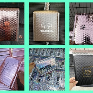 May include: Assortment of metallic bubble mailers with various logos printed on them. The logos include "Posse", "Project Hi", and "Eye Defining".