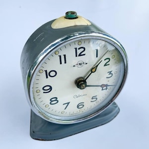 Vintage USSR Mechanical Alarm Clock: Retro Industrial Design, Gray Metal Base