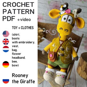 May include: A crochet giraffe toy named Rooney wearing a yellow vest with floral embroidery, green shorts, and beige boots with pink flower details. The giraffe has a flower headband with a bee and a small brown crossbody bag. Text reads CROCHET PATTERN PDF +video.