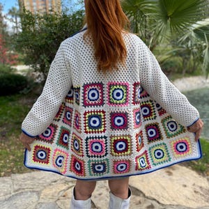 Crochet Evil Eye Motif Collar Neck Coat: Granny Square Duster White Colorful Crochet Cardigan