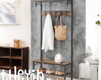 May include: A black metal coat rack with a wooden shelf and shoe storage. The rack has hooks for hanging coats, hats, and bags. There is a small bench underneath the shelf for sitting.
