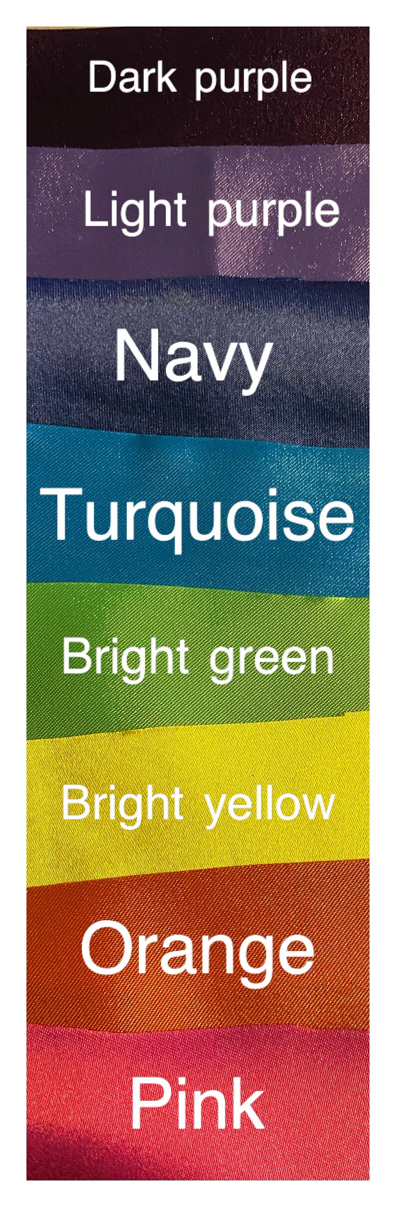 May include: A color palette featuring eight fabric swatches in a variety of colors. The colors include dark purple, light purple, navy, turquoise, bright green, bright yellow, orange, and pink. Each color is labeled with white text.
