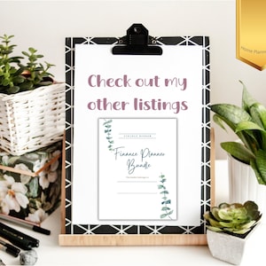 May include: A white clipboard with a black and white geometric pattern border holds a printable "Finance Planner Bundle" document with a floral design. The text "Check out my other listings" is written in pink on the document. The clipboard is on a white surface with a potted succulent and a white wicker basket with a potted plant.