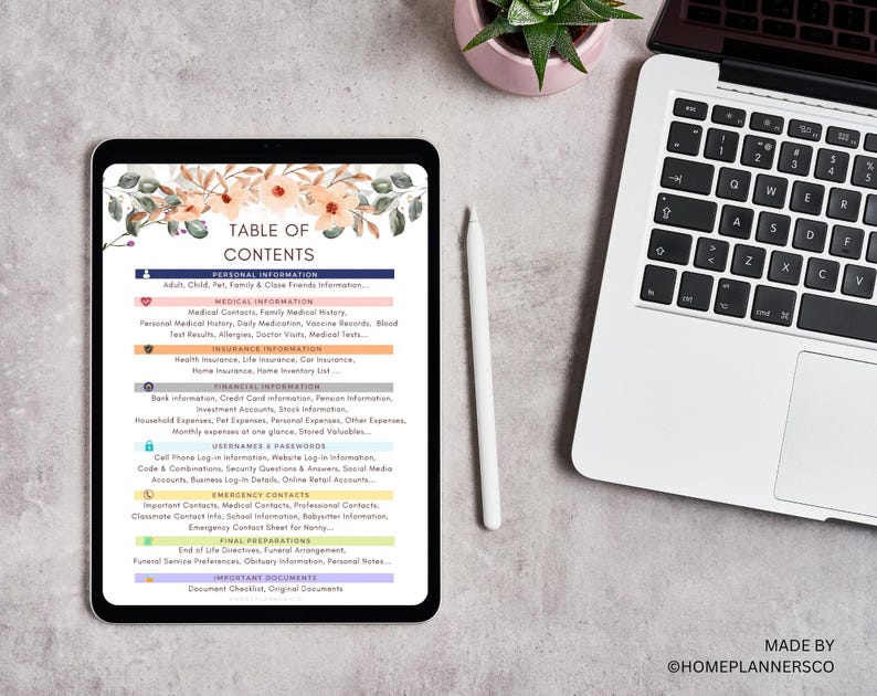 May include: A digital tablet displays a "Table of Contents" page with categories like "Personal Information" and "Medical Information." The tablet is next to a laptop and a white stylus. Floral accents decorate the top of the tablet screen.