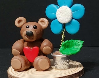 Teddy bear with thimble pot flower, handmade polymer clay miniature ornament on natural wood slice, Mothers Day, Birthday, gift, friend