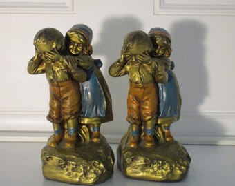 Vintage Bookends of Boy and Girl made by Armor Bronze  in the early 1900's