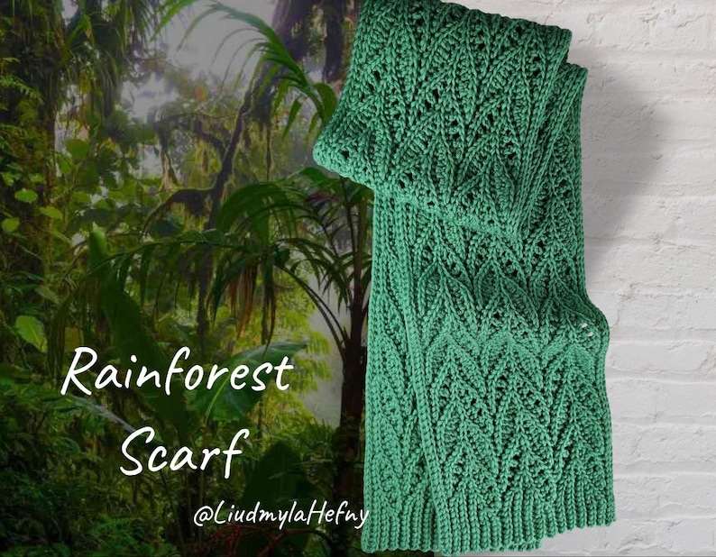 May include: A green crocheted scarf with a lacy pattern. The scarf is called "Rainforest Scarf" and is by @LiudmylaHefny.