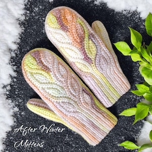 May include: A pair of knitted mittens with a cable knit design. The mittens feature a color palette of yellow, orange, pink, and white. The text "After Winter Mittens" is written in cursive at the bottom of the image.