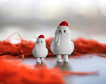 May include: Two white snowman figurines wearing red Santa hats. The larger snowman is standing in front of the smaller snowman. Both snowmen have black eyes and a black beak. The snowmen are sitting on a red, fuzzy surface.