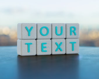 May include: White blocks with the words "YOUR TEXT" spelled out in turquoise blue letters.