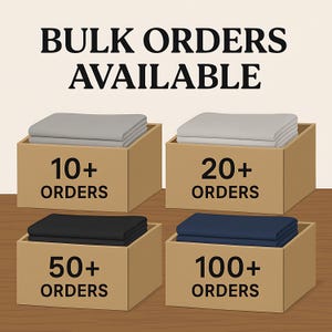 以下が含まれることがあります： BULK ORDERS AVAILABLEと記載された4つの段ボール箱。中には折りたたまれた布が入っており、それぞれ10+ ORDERS、20+ ORDERS、50+ ORDERS、100+ ORDERSと表示されています。布の色はライトグレー、白、黒、ネイビーブルーです。