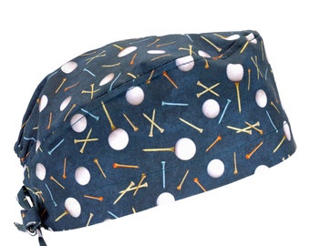 May include: A blue scrub hat with a white golf ball and tee pattern.