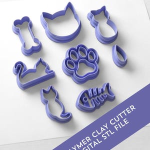 Puede incluir: Un conjunto de cortadores de arcilla polimérica morados con formas de gato, incluyendo un hueso, cabeza de gato, silueta de gato, huella de pata, lágrima, esqueleto de pez y un gato sentado. Texto en una pancarta morada: "POLYMER CLAY CUTTER DIGITAL STL FILE."