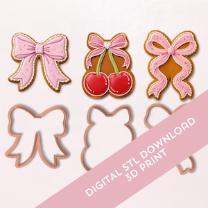 Könnte beinhalten: Das Bild zeigt dekorierte Lebkuchen in Form von Schleifen und Kirschen sowie kupferfarbene Ausstecher in Schleifenform. Die Kekse haben rosa Zuckergussdetails. Text auf einem diagonalen Banner lautet "DIGITAL STL DOWNLOAD 3D PRINT".