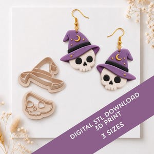 May include: A pair of earrings featuring white skulls wearing purple witch hats with gold crescent moon and star accents, alongside two beige plastic cookie cutters in the shape of a witch hat and a skull, with text reading DIGITAL STL DOWNLOAD 3D PRINT 3 SIZES.