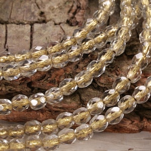 Czech Glass 4mm Fire Polished Round - Crystal w/ Gold Lining
