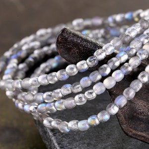 Czech Glass 3mm Round Druk - Textured Crystal AB w/ Silver