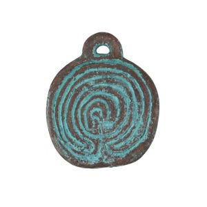 May include: A round, bronze-colored pendant with a turquoise spiral design. The pendant has a small loop at the top for hanging. The spiral pattern is centered on the pendant, creating a unique and eye-catching design.