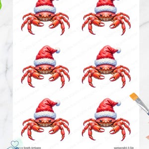 May include: A sheet of decoupage rice paper featuring six identical illustrations of a red crab wearing a red and white Santa hat. The text Down South Artisans and santacrab1-3.5in is printed on the sheet, which also shows a paintbrush.