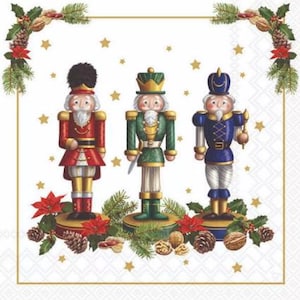 May include: Three decorative nutcrackers in red, green, and blue uniforms, each with a unique hat and facial features. The image is framed with a gold border and adorned with festive elements like pinecones, poinsettias, and stars, evoking a holiday theme.