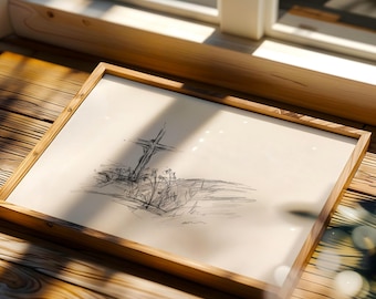 May include: A framed black and white pencil drawing of a cross in a field of grass. The drawing is in a simple wooden frame.