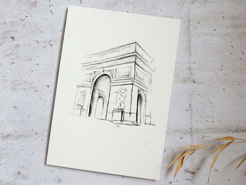 May include: A black and white pencil sketch of the Arc de Triomphe in Paris, France.