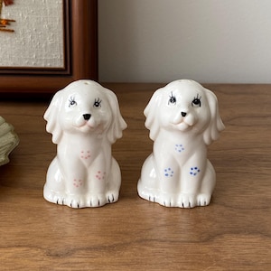 Vintage Ceramic Dog Salt and Pepper Shakers – White Spaniels with Blue and Pink Paw Prints – 1950s Collectibles