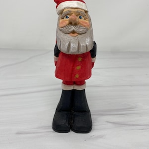Santa with backpack wood carving Christmas hand carved and painted decor figurine